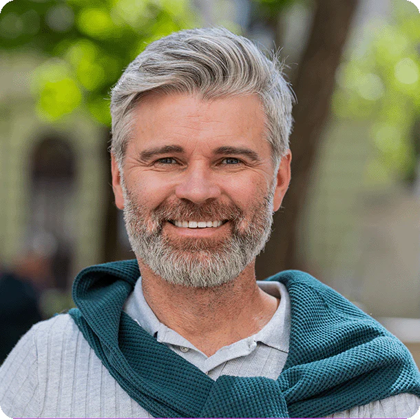 Mid aged men with full hair after use of PrimeGENIX DHT Balance